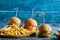 Cheeseburgers with fry potato on the wooden board