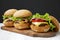 Cheeseburgers on rustic wooden board, side view. Close-up