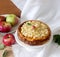 Cheesecake or casserole from cottage cheese with apples, served with apple sauce compote. Rustic style.