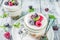 Cheesecake in portioned jars with summer berries