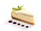 Cheesecake slice decorated with mint leaf