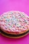 Cheesecake with Small Marshmallows for Party on Pink Background