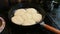 Cheesecakes round shape fried in a cast iron skillet