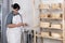 Cheesemaker pours the rennet with a syringe