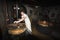 A cheesemonger in a ancient dairy, Franche-ComtÃ©, France