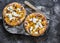 Cheesy autumn veggie flatbread. Pumpkin, sweet potato, red onion, mozzarella pizza on dark background, top view