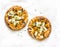 Cheesy autumn veggie flatbread. Pumpkin, sweet potato, red onion, mozzarella pizza on light background, top view