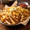 cheesy fries with a red sauce dip