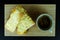 Cheesy Garlic Bread and hot coffee on wooden plate