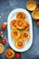 Cheesy tomato tartlets