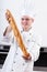 Chef with big baguette