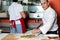 Chef busy in preparing pizza