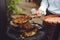 The chef checks the meat on the grill. Grilled golden ribs steaks, delicious food