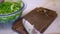 Chef chopping lettuce rapidly at home kitchen