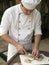 Chef chopping mushrooms