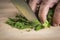 Chef chopping parsley leaves