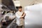 Chef with clipboard doing inventory at kitchen