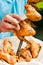 Chef cook preparing grilled chicken wings