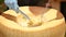 Chef cook preparing Italian pasta in a parmesan