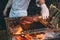 Chef Cooking steak. Cook turns the meat on the fire.