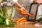 The chef cooks fresh carrots for salad. The concept of losing healthy and wholesome food, detox, vegan eating, diet, cooking. Slow