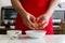 Chef cracking egg into a bowl for cooking