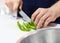 Chef cuts the vegetables cooking in a kitchen, hands slicing vegetables, preparing vegetables