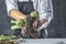 Chef cutting artichokes for dinner preparation - Man cooking inside restaurant kitchen