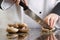 Chef Cutting Brown Mushrooms