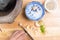 Chef cutting garlic on wooden board