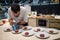 Chef decorating plates with steak tar tar before serving.