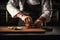 a chef, with a fork and knife in hand, preparing to take the first bite of their deliciously prepared food