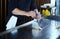 Chef frying shrimps and vegetables restaurant kitchen stove, selective focus