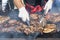 Chef grilling meat during cookout picnic or food event. Meat mix variety, Labour Day, 1 Mai