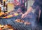 Chef is grilling perfect steak on cast iron grate