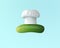 Chef hat with cucumber concept on pastel blue background. minima