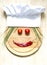 Chef hat on cutting board abstract food concept