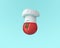 Chef hat with tomato concept on pastel blue background. minimal
