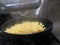 chef itir fry propellers pasta with sauce pan in professional restaurant kitchen