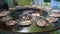 Chef looking after barbecue grill fireplace with baking minced meat for burgers