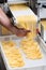 Chef making fresh tagliatelle pasta