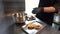 Chef making tasty burger. Cheeseburger with beef patty, cheese, tomato, onion.