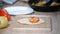 Chef making tortilla with chicken, corn and bell peppers.