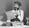 Chef near pasta, vegetables and dough. Cooking process concept. Man with beard holds recipe book