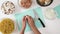 Chef peeling garlic close up on cutting board. Pasta with chicken, mushrooms, and Alfredo sauce recipe.