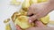 Chef peeling potatoes.The knife removes the skin of vegetables.