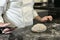 Chef or person preparing dough pastry for home made fresh bread, baking bread at home