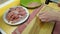 A chef pounding meat. Close-up shot