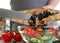 Chef Pouring Round Pieces Black Olive Salad Bowl