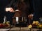 The chef prepares crayfish with vegetables. In the photo, the cook is throwing crayfish into a saucepan. On the table are